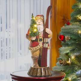 Lighted 15.5 in. Santa Claus with Skis Figurine